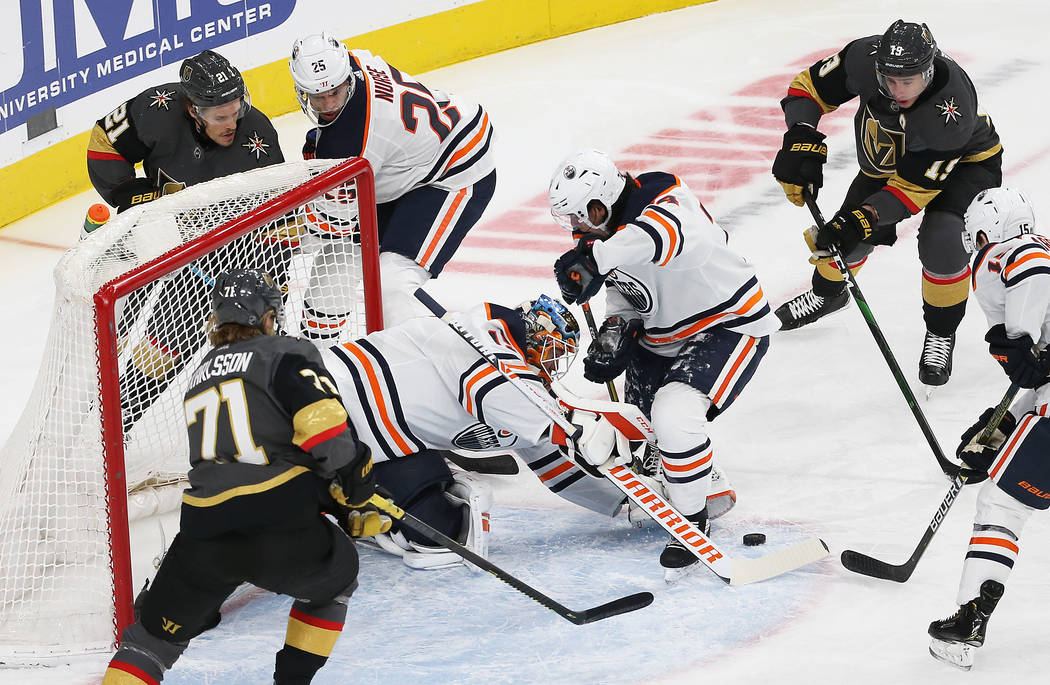 Edmonton Oilers goaltender Mikko Koskinen (19) makes a save against Vegas Golden Knights center ...