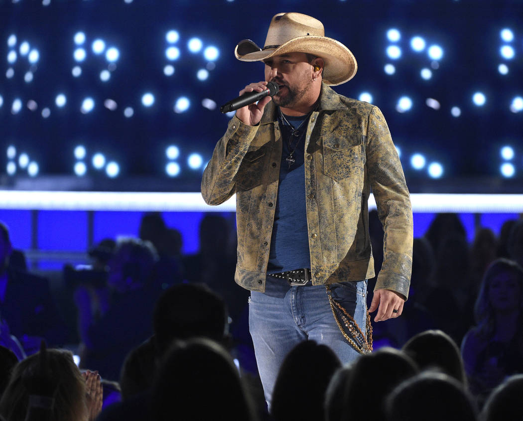 This April 7, 2019 file photo shows Jason Aldean performing "Can't Hide Red" at the 54th annual ...