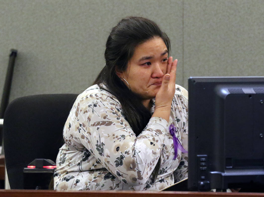 Kerri Andersen, the aunt of murder victim 3-year-old Abygaile Bennett, weeps as she reads her i ...