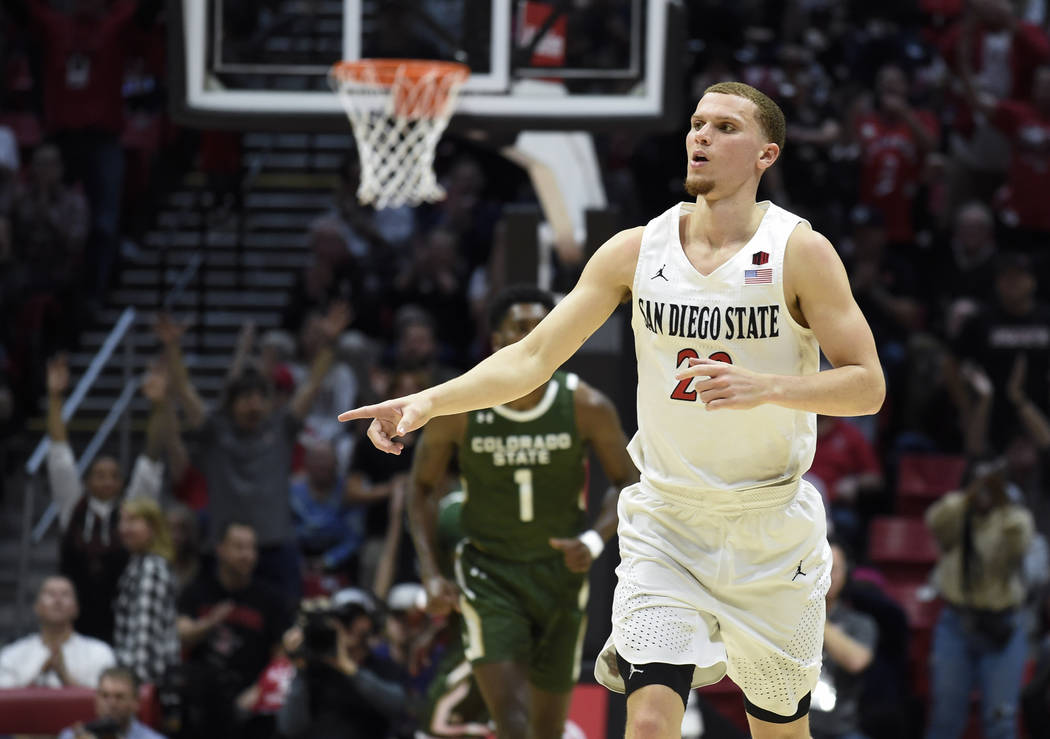 San Diego State guard Malachi Flynn (22) reacts after hitting a three-point shot during the sec ...