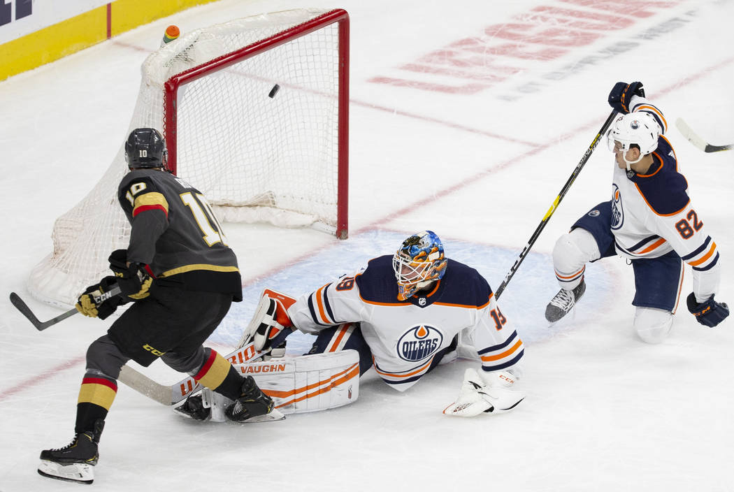 Edmonton Oilers goaltender Mikko Koskinen (19) makes a save against Golden Knights center Nicol ...