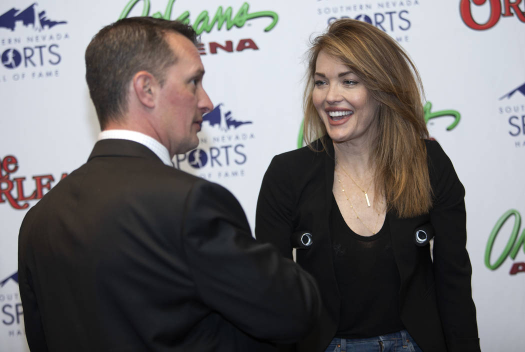 Amy Purdy, a Paralympic snowboarder, speaks with Southern Nevada Sports Hall of Fame executive ...