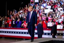 President Donald Trump arrives for a rally at the Las Vegas Convention Center in Las Vegas on F ...