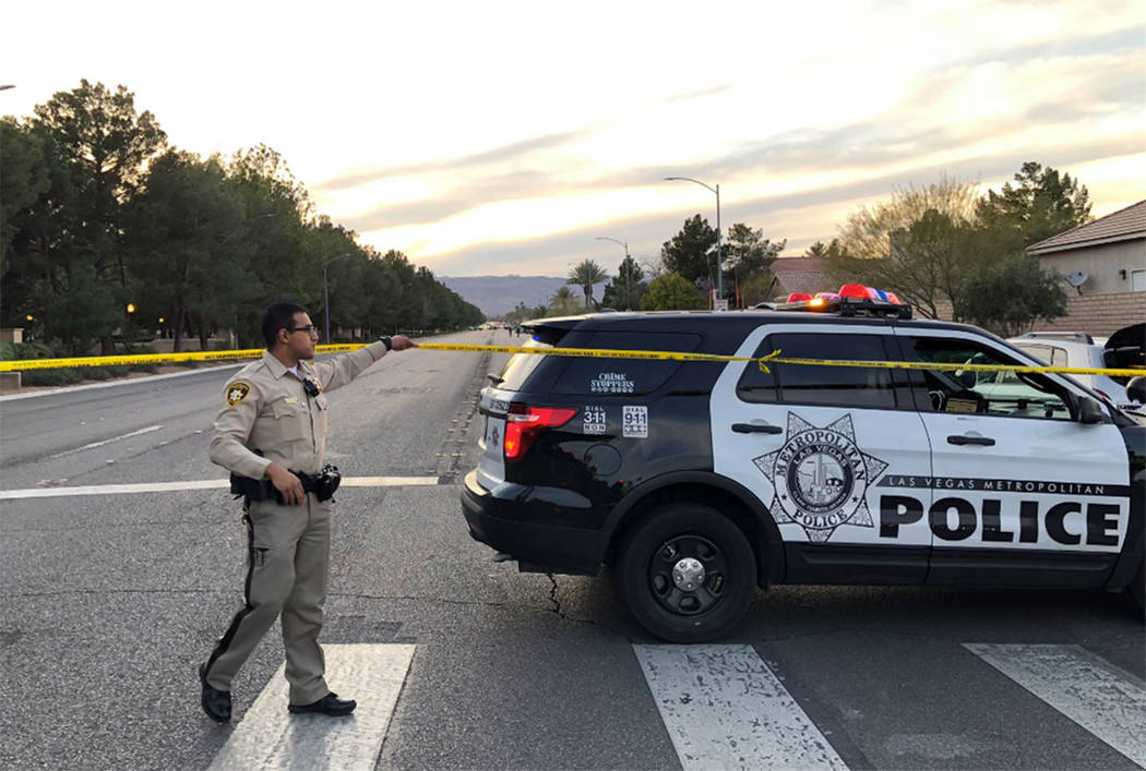 Police secure the scene of a fatal crash near Tropicana Avenue and Buffalo Drive in Las Vegas o ...