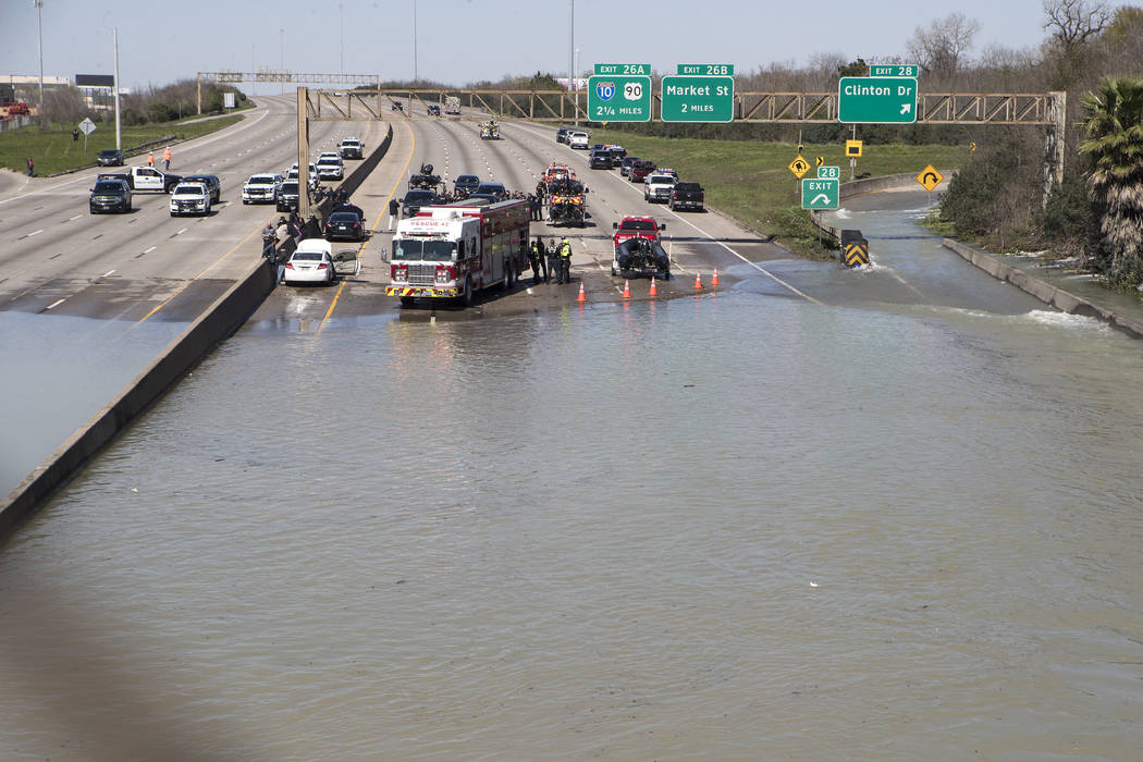 High water from a water main break floods the East Loop 610 on Thursday, Feb. 27, 2020 in Houst ...