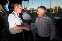Former Oakland Raiders linebacker Ted Hendricks, left, mingles with attendees during the Raider ...
