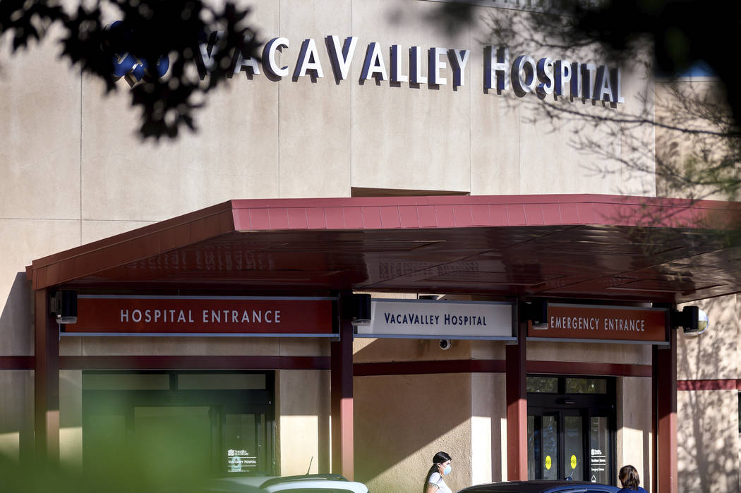A person leaves NorthBay VacaValley Hospital, where a woman diagnosed with coronavirus previous ...