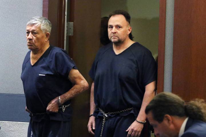Former Las Vegas police officer Christopher Peto, 47, right, enters the courtroom during his co ...