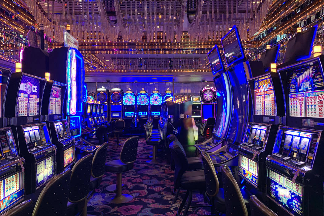 Slot machines at Four Queens show "out of order" messages on Friday, Feb. 28, 2020. ( ...