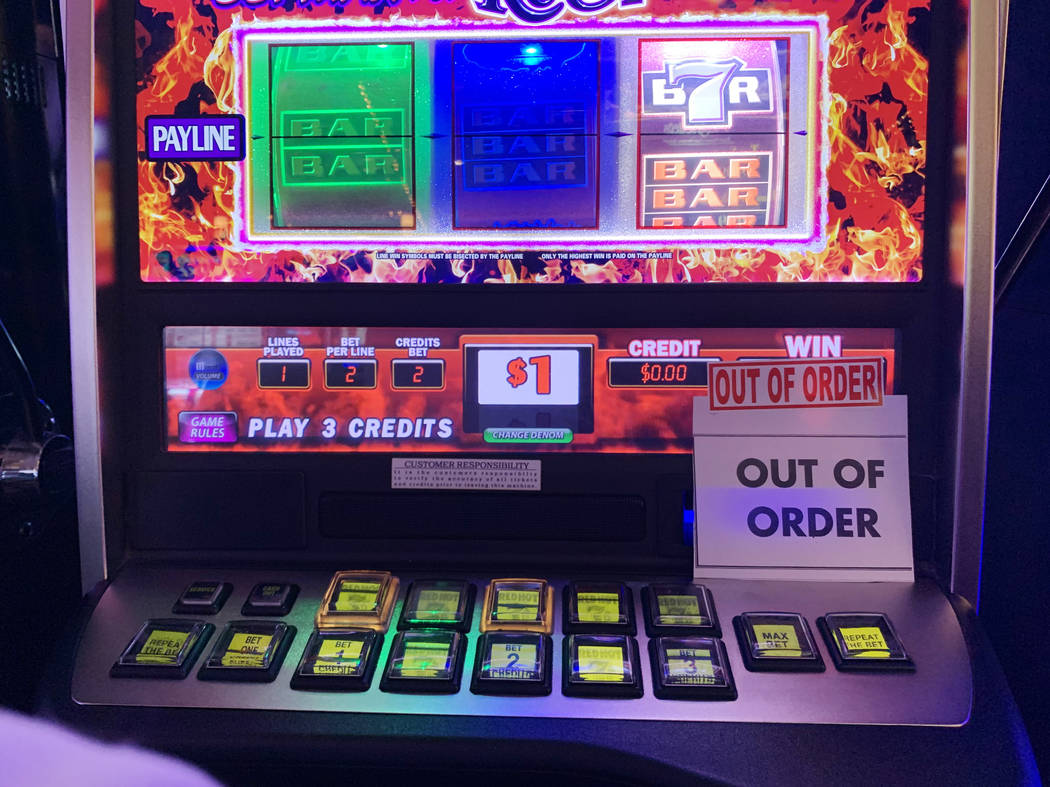 Slot machines at Four Queens show "out of order" messages on Friday, Feb. 28, 2020. ( ...