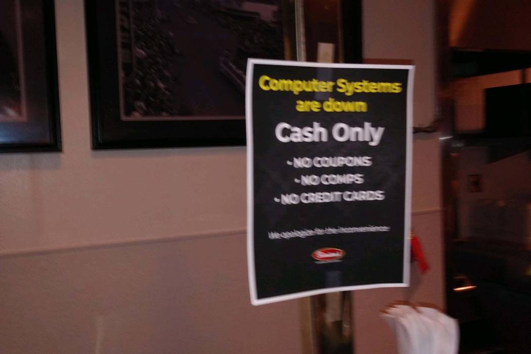 A sign at Binion's on Feb. 27, 2020, tells guests that its computer systems are down. (Robert M ...