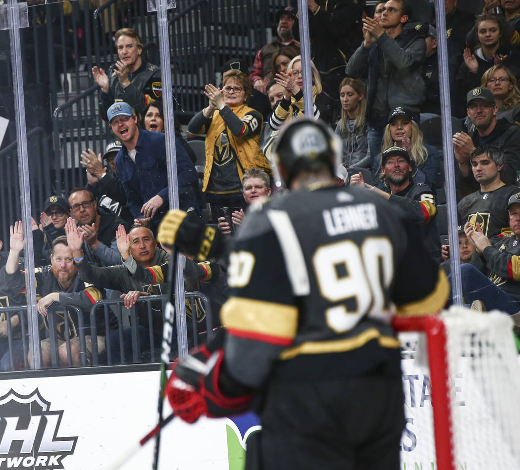 Golden Knights fans cheer after a stop by Golden Knights goaltender Robin Lehner (90) during th ...