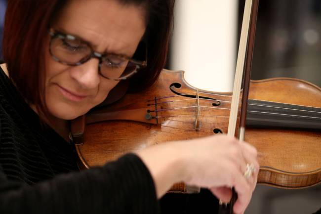 Las Vegas Philharmonic concertmaster De Ann Letourneau plays a 300-year-old Stradivarius violin ...