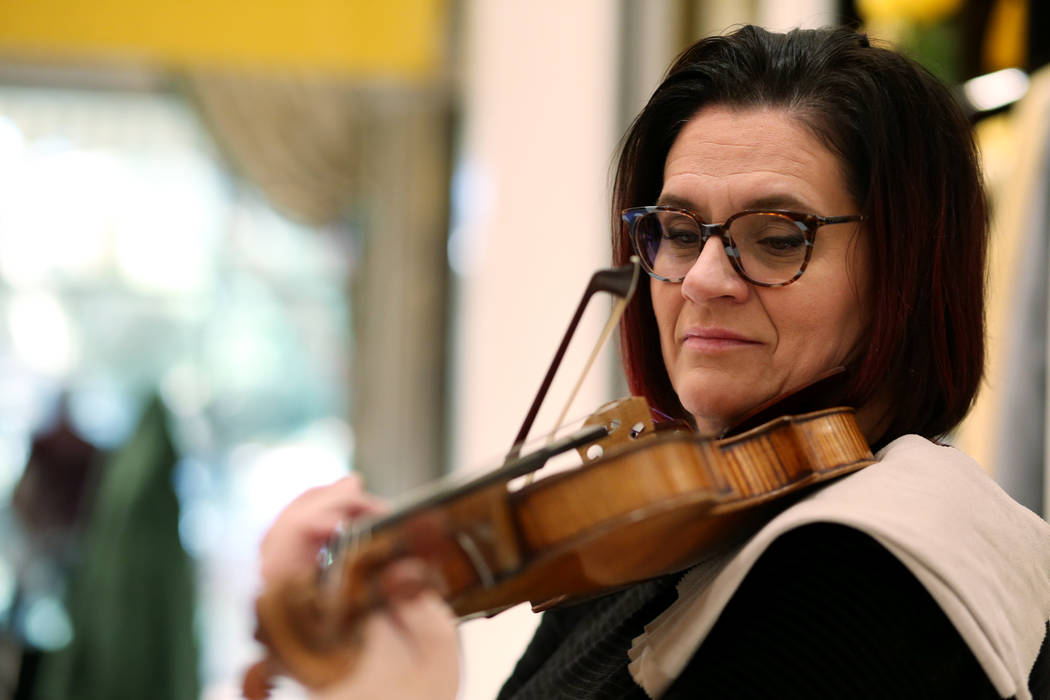 Las Vegas Philharmonic concertmaster De Ann Letourneau plays a 300-year-old Stradivarius violin ...