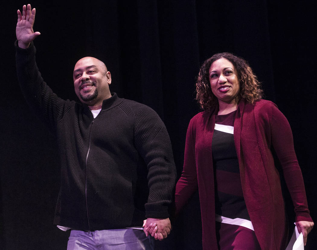 Raymond Santana Jr., left, and Natalie Nelson, CSN diversity initiatives coordinator, walk on s ...