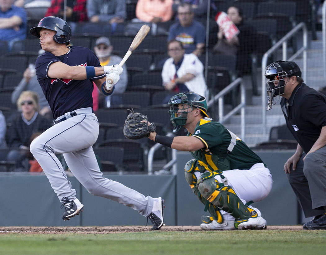 Cleveland Indians outfielder Alex Call (71) singles in a run in the eighth inning during a Majo ...