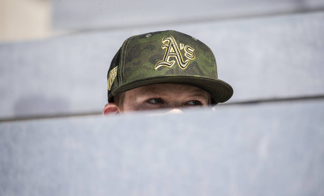 Oakland Athletics fan Ryan Lang, 8, from Pleasanton, Calif., watches a Major League Baseball ga ...
