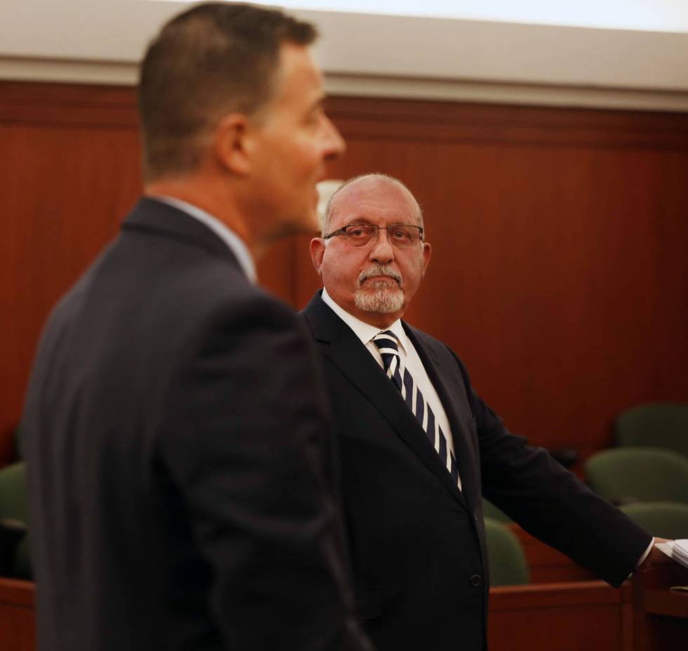 Attorney Christian Matthew, representing the Las Vegas Metropolitan Police Department, left, an ...