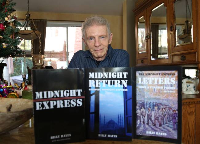 Billy Hayes with his books at his Summerlin home. He's been telling his story of being in Turki ...