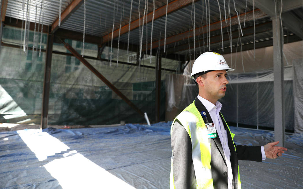 Henderson Hospital operating manager Ryan Tingey gives a tour of the Henderson Hospital's new d ...