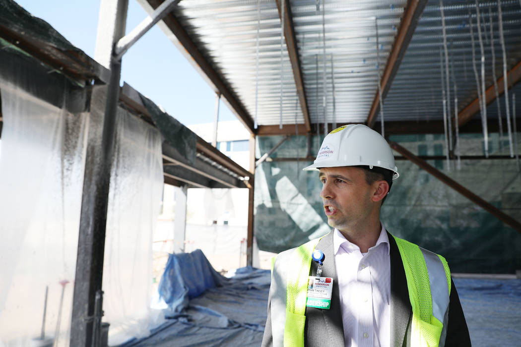 Henderson Hospital operating manager Ryan Tingey gives a tour of the Henderson Hospital's new d ...