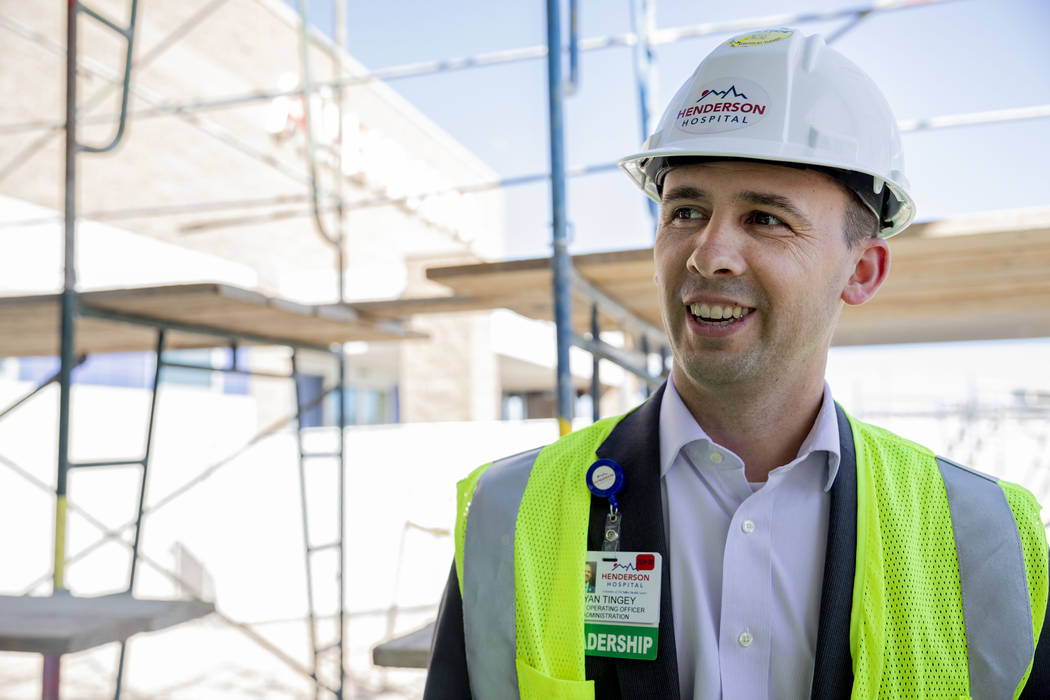 Henderson Hospital operating manager Ryan Tingey gives a tour of the Henderson Hospital's const ...