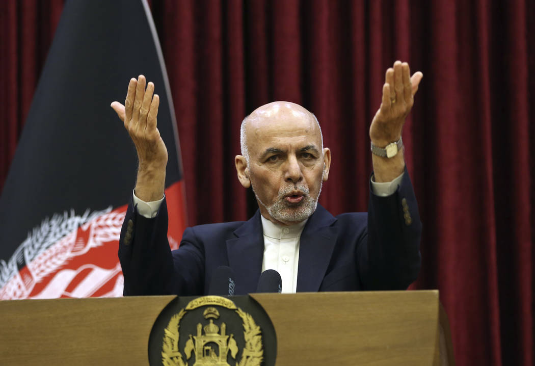 Afghan President Ashraf Ghani speaks during a news conference at the presidential palace in Kab ...