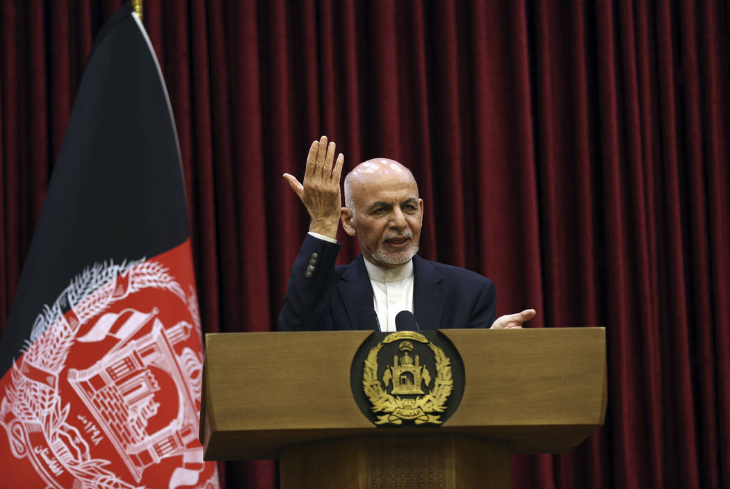 Afghan President Ashraf Ghani speaks during a news conference at the presidential palace in Kab ...