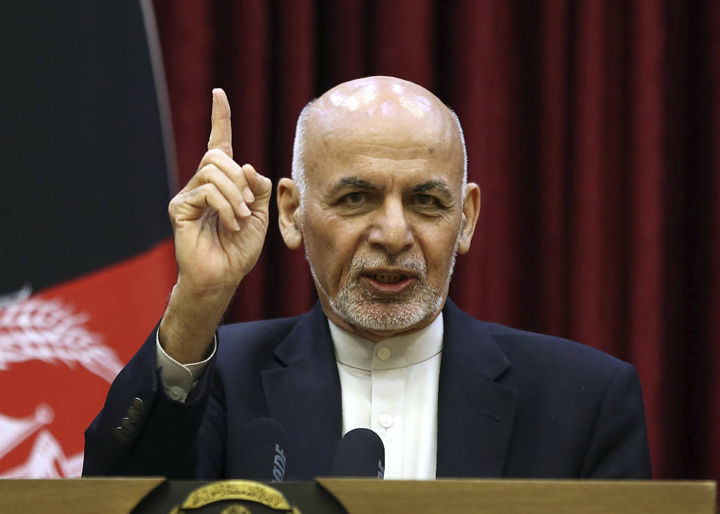 Afghan President Ashraf Ghani speaks during a news conference at the presidential palace in Kab ...