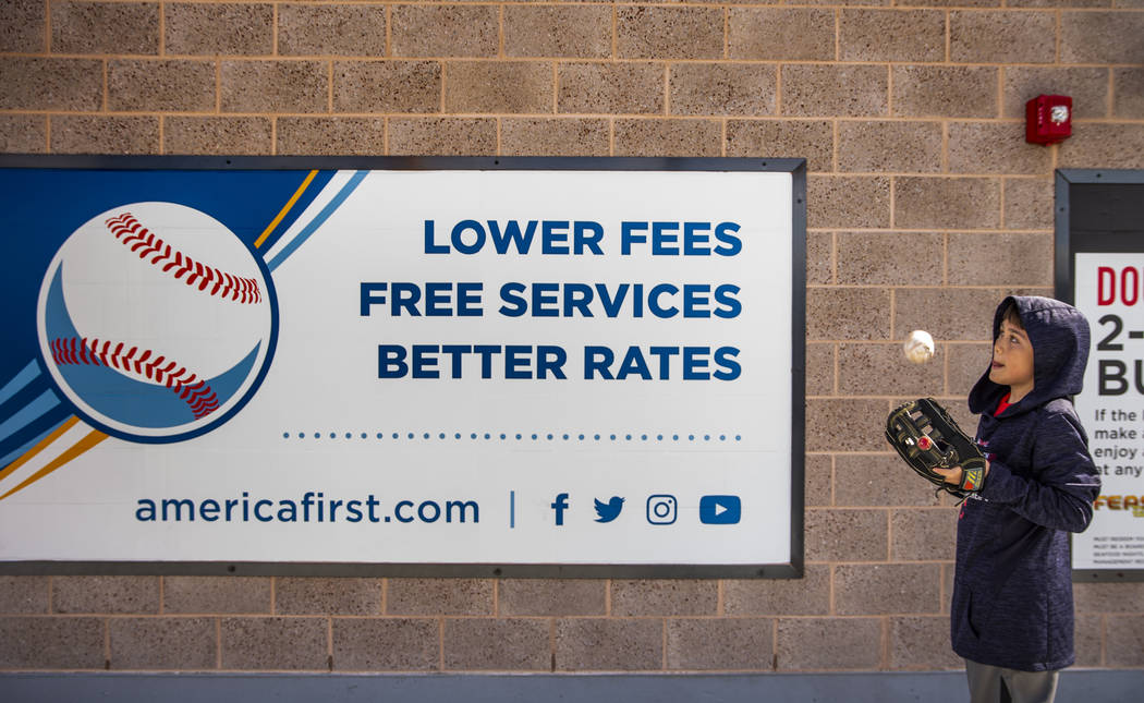 Geddy Ramirez, 13, practices catching a ball off the wall as the Cleveland Indians battle the O ...