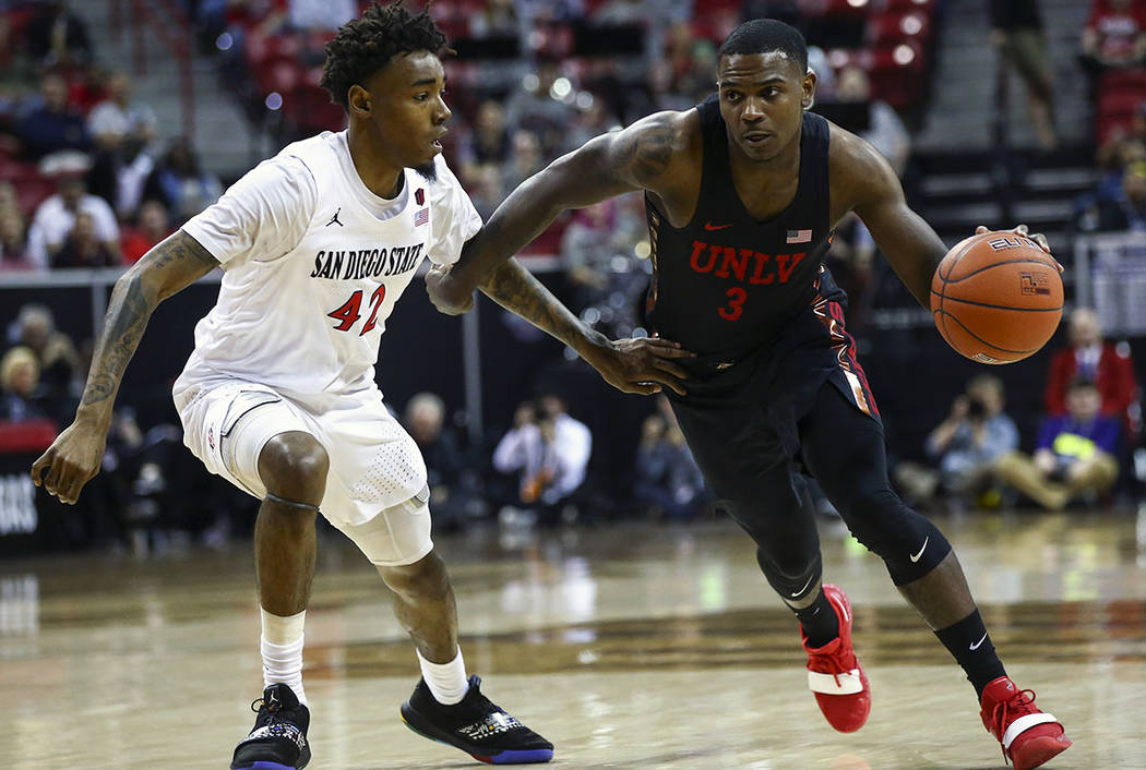 UNLV Rebels guard Amauri Hardy (3) brings the ball up court against San Diego State Aztecs guar ...