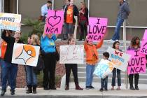 Parents and students supporting the online Nevada Connections Academy charter school protest ou ...