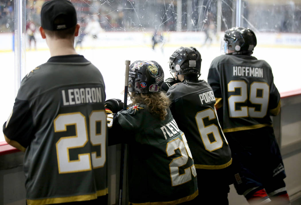 Make-A-Wish kids, from left, Ethan LeBaron, 14, of Las Vegas, Roman Runnalls, 10, of Canada, Je ...