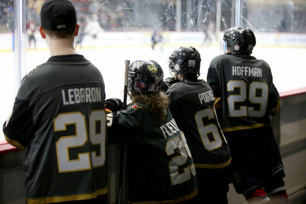 Make-A-Wish kids, from left, Ethan LeBaron, 14, of Las Vegas, Roman Runnalls, 10, of Canada, Je ...