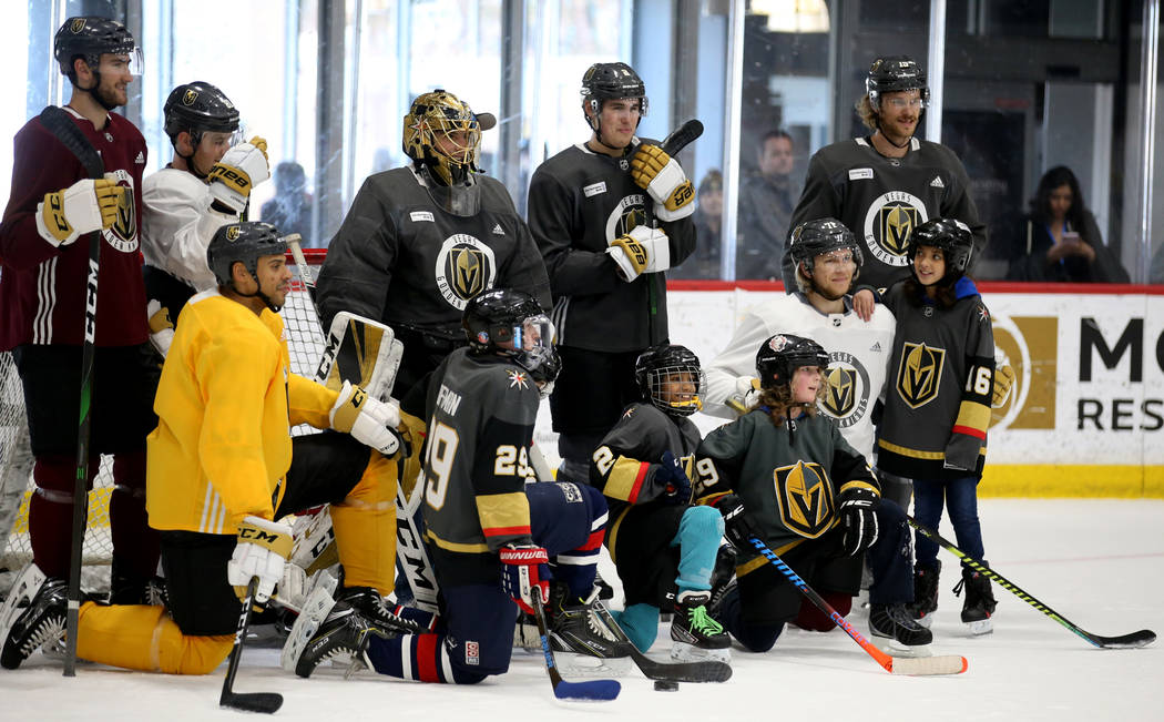 Make-A-Wish kids pose with Vegas Golden Knights players during practice at City National Arena ...