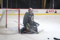 Golden Knights goalie Robin Lehner prepares to block a shot during practice at City National Ar ...