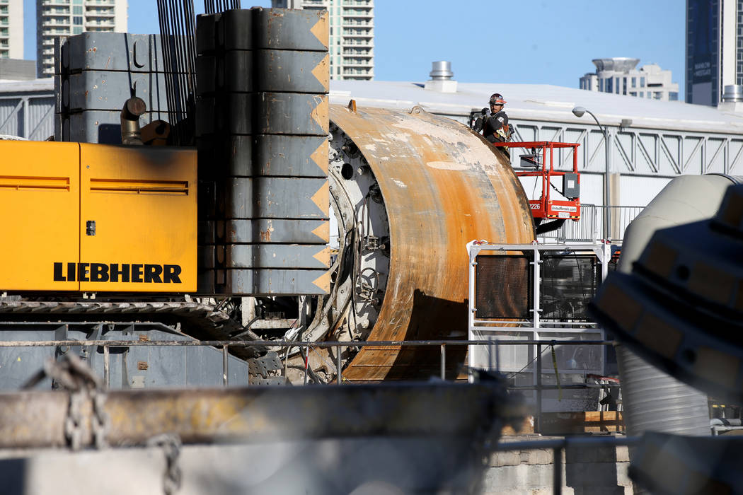 The Boring Co. workers prepare to lower the drill assembly to begin work on the second tunnel i ...