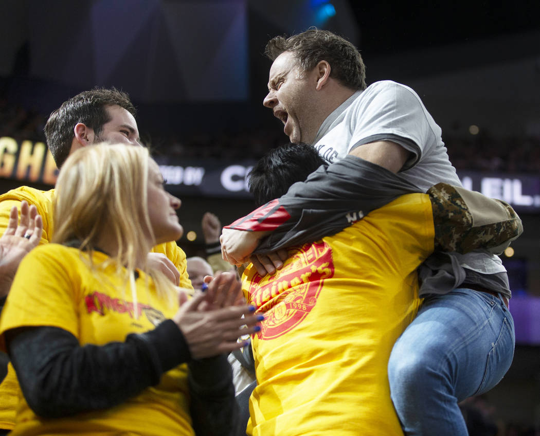 The crowd cheers for Golden Knights super fan John "Hulk" Baratta, who died unexpecte ...