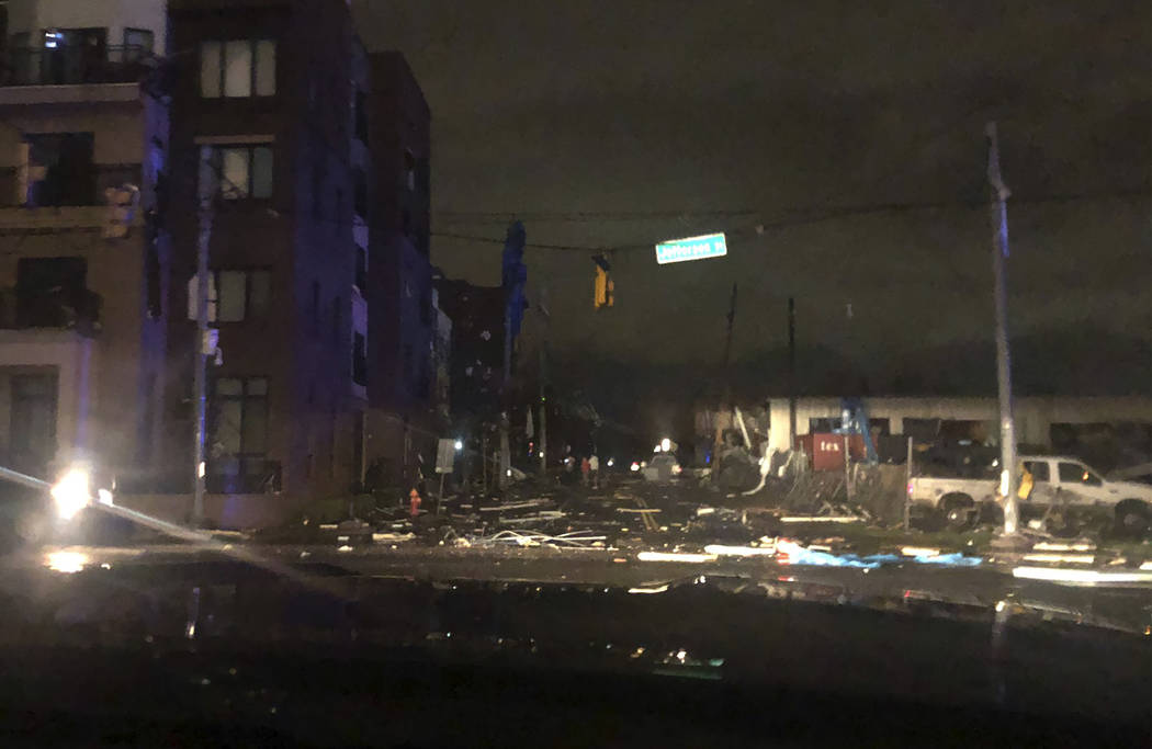 Debris scattered across an intersection Tuesday, March 3, 2020, in downtown Nashville, Tenn. Th ...