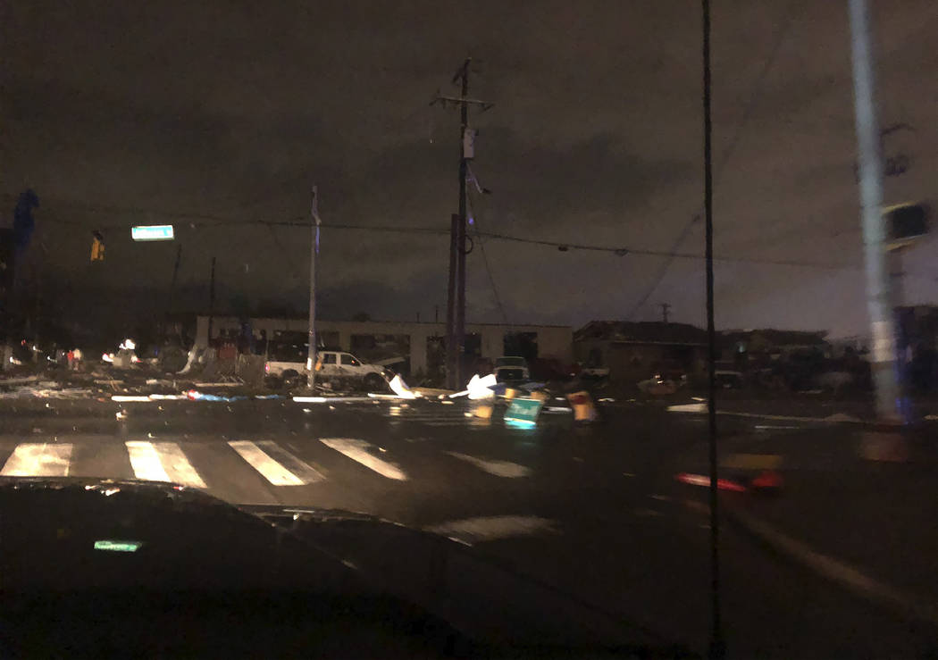 Debris scattered across an intersection Tuesday, March 3, 2020, in downtown Nashville, Tenn. Th ...
