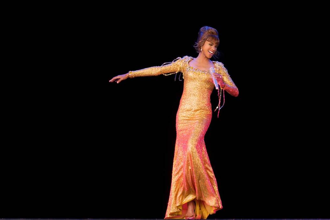 An image from "An Evening with Whitney - The Whitney Houston Hologram Concert" is shown. The p ...