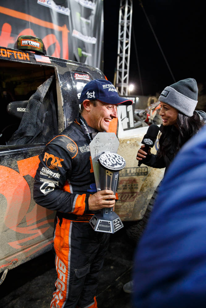Former NASCAR racer Justin Lofton is interviewed after winning his third overall title in the M ...