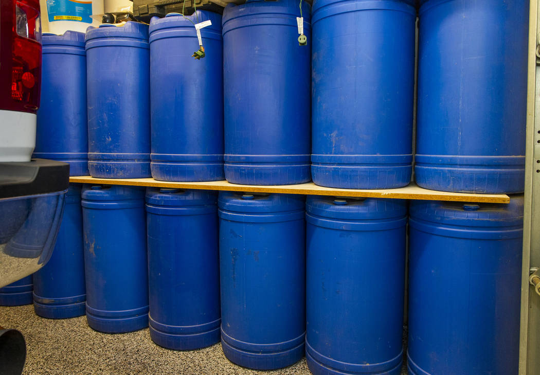 Barrels of water stored in the home garage of Cory and Holly Steed on Monday, March 2, 2020 in ...