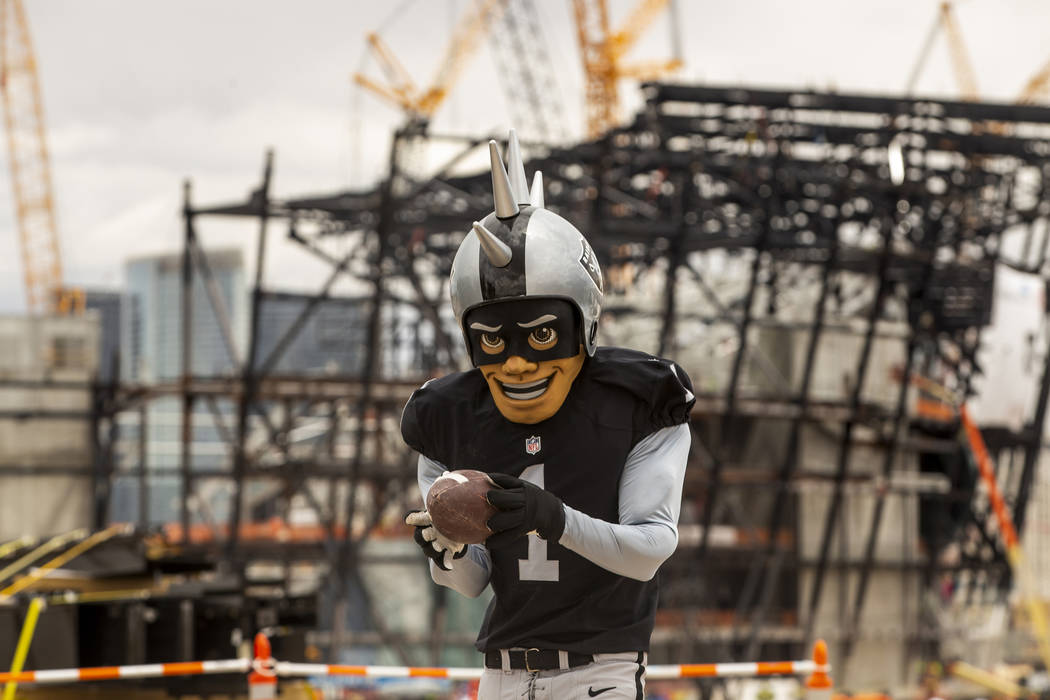 Raiders mascot Rusher catches a pass during an event for Nevada Law Enforcement and Special Oly ...