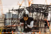 Raiders mascot Rusher catches a pass during an event for Nevada Law Enforcement and Special Oly ...