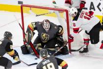 Vegas Golden Knights goaltender Robin Lehner (90) makes a save against New Jersey Devils center ...