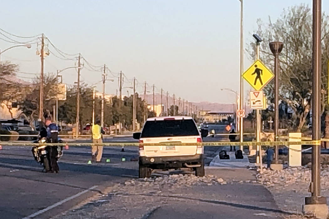 North Las Vegas police investigate after a crash at Lone Mountain and Losee roads in North Las ...