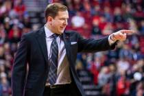 UNLV Rebels head coach T.J.Otzelberger directs his players on the court versus the New Mexico L ...