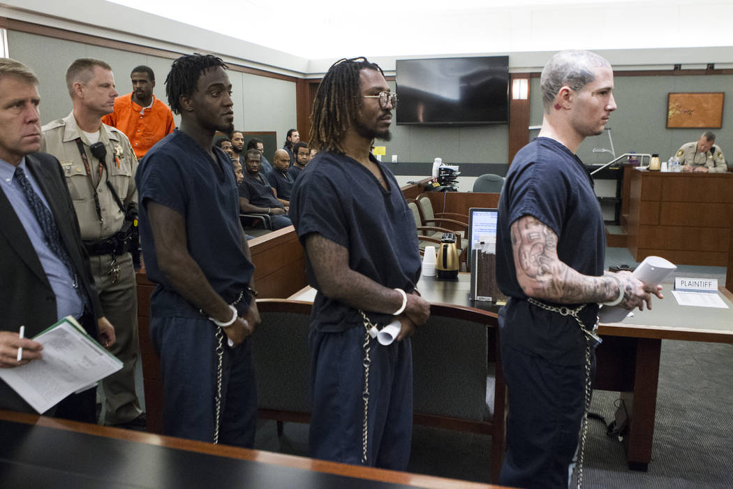 Devonte Wash, from left, Arthur Moore and Nadin Hiko, charged in the 2009 shooting death of 16- ...