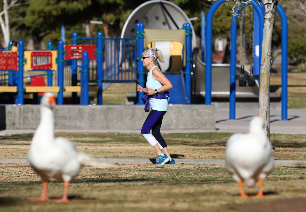 A woman joggs at Sunset Park during a sunny morning on Wednesday, March 4, 2020, in Las Vegas. ...
